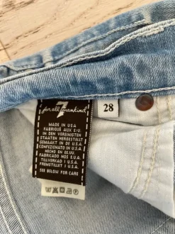 7 for all Mankinds ljusblå lågmidjade skinny jeans