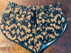 ASOS baroque pattern gold and black swim shorts