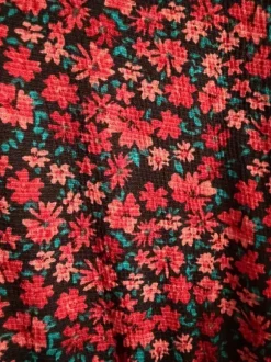 Blommig klänning storlek L