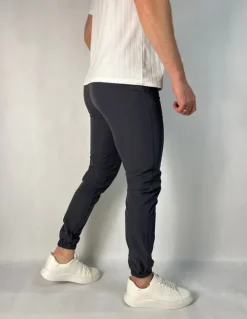 Ciemnoszare cienkie spodnie męskie dresowe sportowe elastyczne Closure Ldn performance S
