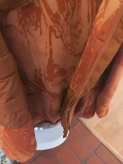 En fleecetröja i brunt orange väldigt fin