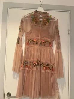 Frock and frill storlek 10