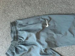Grå Nike miler bukser
