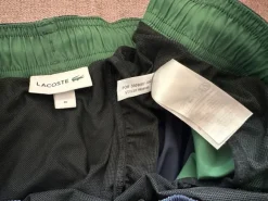 Granatowe spodenki kąpielowe Lacoste, rozmiar M
