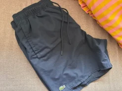 Granatowe spodenki kąpielowe Lacoste, rozmiar M