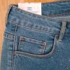 H&M jeans blå skinny ankle highwaist jeans med påsatte krystaller foran str. 31.