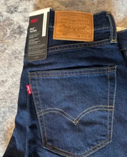 Mörkblå Levis 502 Taper 33/36