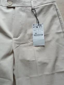 Nowe spodnie Stradivarius z metką rozmiar 34 xs kolor beżowy