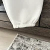 Spodnie damskie baggy z kwiatem