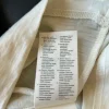 Tynd 100% uld bluse med kontrastkant