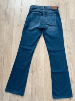 Wrangler Jeansy Dzwony W28 L32 Bootcut Vintage Flare Y2K Denim Trend 2026