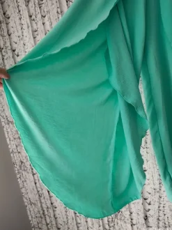 Zwiewne Spodnie Alladynki Rozcięte Nogawki Miętowe Włoskie Boho
